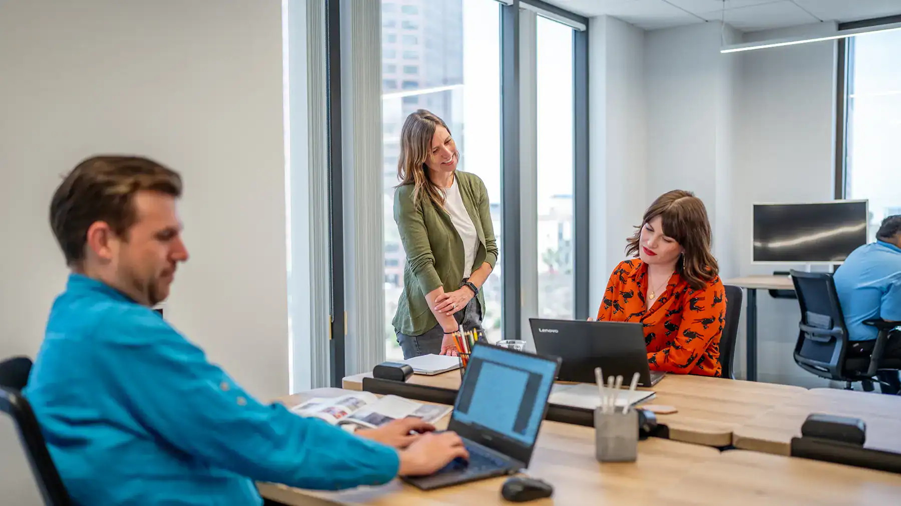 Members collaborating at a coworking space in Downtown Los Angeles