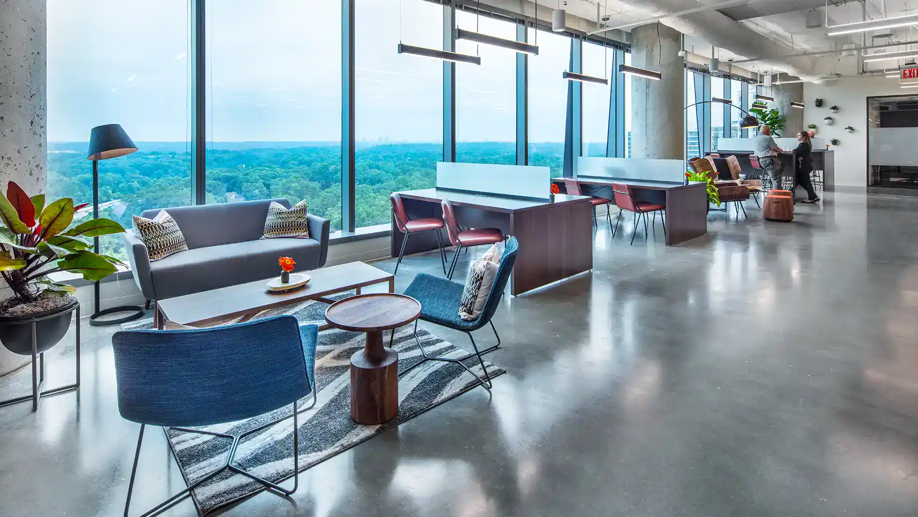 Professionals working at open desks at a coworking space in Buckhead Atlanta